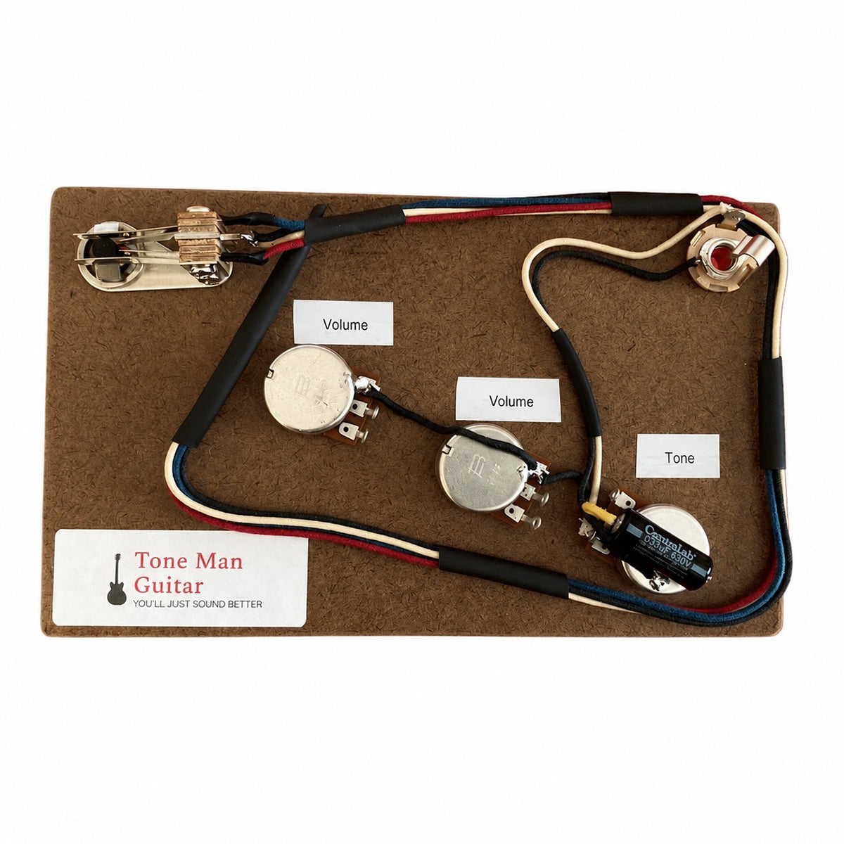 Prewired Explorer wiring harness with Bourns 500K pots, Centralab PIO .033uF tone cap, 3-way switch and jack